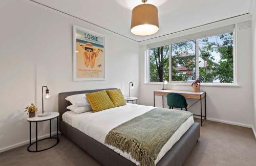 Prahran Apartment | Urban Retro - Experience Vibrant Courtyard Charm