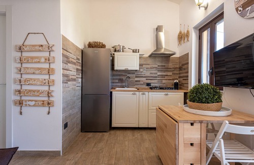 Campofelice di Roccella House | Vacation Home "In Villaggio Centopini" with Shared Pool, 2 Balconies & A/C