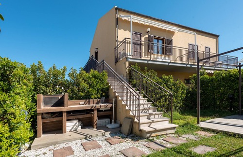 Campofelice di Roccella House | Vacation Home "In Villaggio Centopini" with Shared Pool, 2 Balconies & A/C