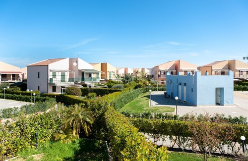 Campofelice di Roccella House | Vacation Home "In Villaggio Centopini" with Shared Pool, 2 Balconies & A/C