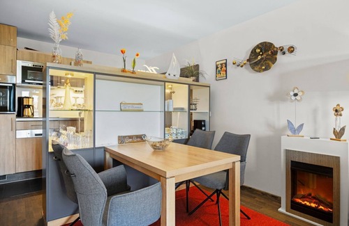 Wremen Apartment | Vacation apartment near the beach with sauna and great, large balcony with XXL beach chair