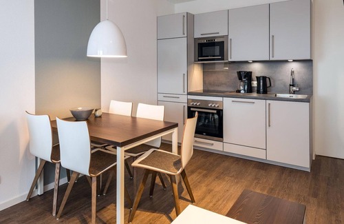 Bensersiel Apartment | Vacation apartment close to the beach with balconies, parking, use of swimming pool & sauna