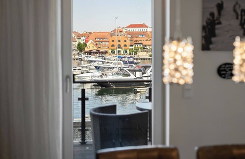 Muritz Apartment | Vacation apartment with water view on the 1st floor of the Hafenresidenz Waren