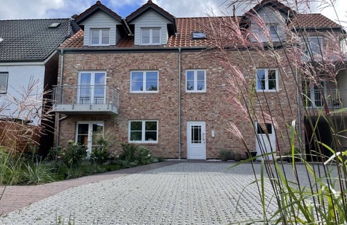 Toenning Apartment | Vacation apartment "Norderhus" (WH2) with 70sqm - quiet central location - with balcony