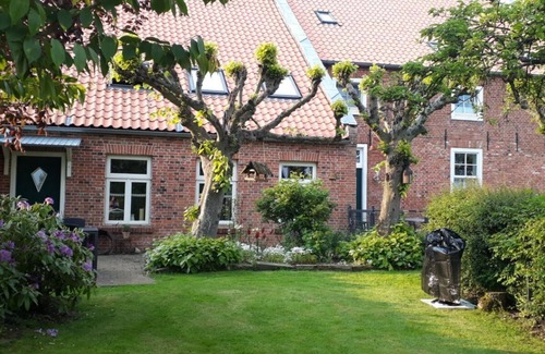 Dornum Apartment | Vacation apartment Nordnest on historic Gulfhof