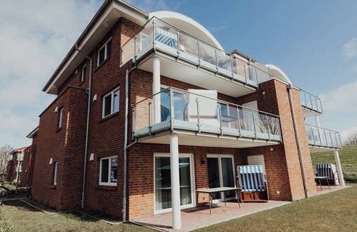 Wangerland Apartment | Vacation apartment "Seeadler": Exclusive comfort and relaxation on the coast.