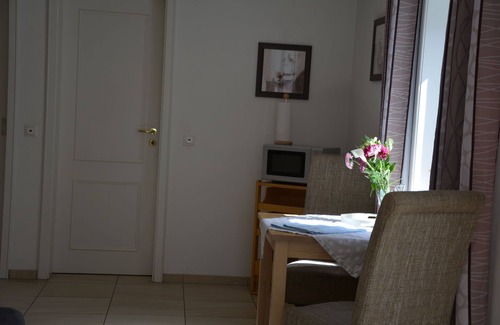 Steenodde Apartment | Vacation apartment Strandhase on the ground floor with terrace and barbecue fireplace