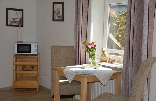 Steenodde Apartment | Vacation apartment Strandhase on the ground floor with terrace and barbecue fireplace