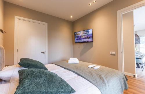 Wekerom Villa | Veluwe Villa met Binnenzwembad & Wellness - 12 personen - Resort Valley