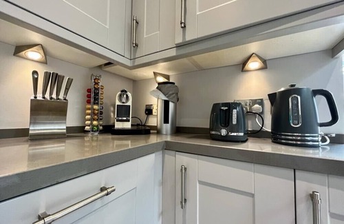 Cambridge House | Victorian Home with Courtyard, Off-Site Parking