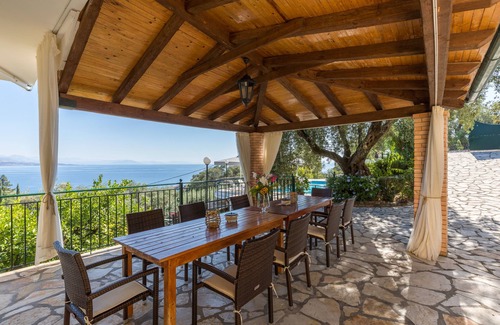 Barbati Villa | Villa Andonis Nissaki is a large villa with a private large pool and sea view.
