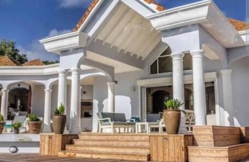 Orient Bay Villa | Villa Beauvoir: Sunrise & Ocean View