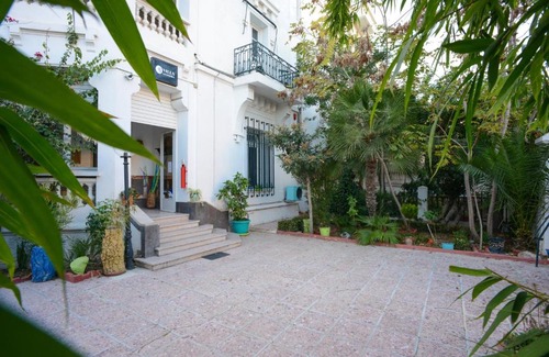 Jeanne d'Arc Bed & Breakfast | Villa Les Palmes - Chambre d'hôtes