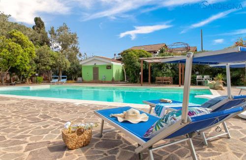 Porto Torres Villa | Villa Melograno with exclusive swimming pool surrounded by greenery