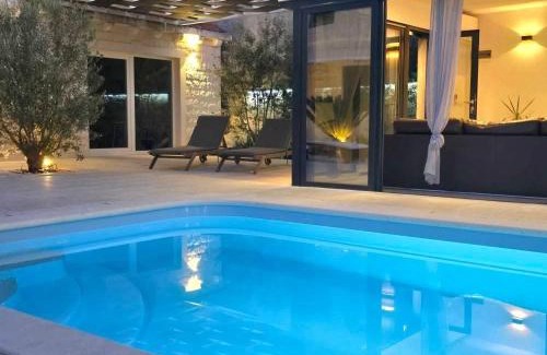 Milna (Brac) House | Villa TM with private heated pool, poolhouse & private garage