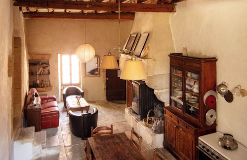 Meynes House | Village house in its original state (under the bell tower)