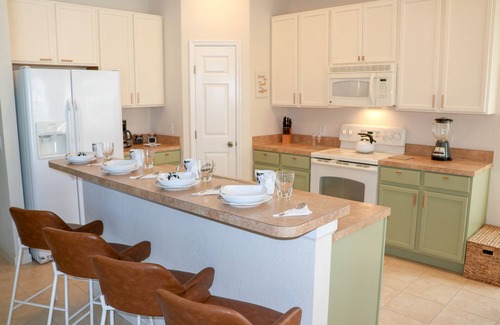 Trafalgar Village House | Village Resort close to theme parks! Family vacation home with Club House