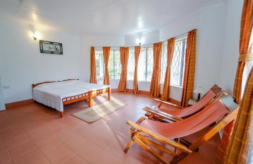 Devikolam House | Viriparai Tea Bungalow Munnar by VOYE HOMES - Surrounded by Tea Plantations