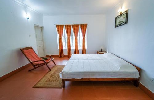 Devikolam House | Viriparai Tea Bungalow Munnar by VOYE HOMES - Surrounded by Tea Plantations