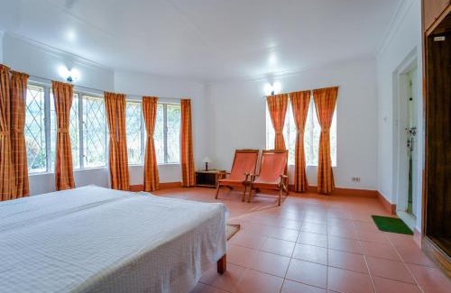 Devikolam House | Viriparai Tea Bungalow Munnar by VOYE HOMES - Surrounded by Tea Plantations