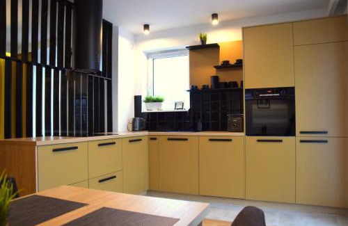 Koszalin Apartment | W&K - Gold Suite - Parking w garażu, Faktura VAT, Klimatyzacja, 5 min od dworca