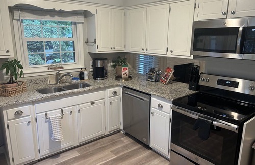 Cary House | Walk to downtown Cary-pet friendly with large fenced yard, a peaceful retreat!