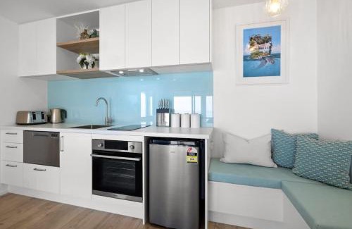 Bell Block Apartment | Wanaka Studio - sea views from your private patio