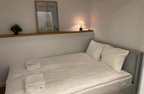 Praga Apartment | Warsaw Okrzei Apartment - City Center via pedestrian bridge