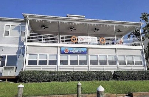 Slidell Condo | Waterfront, Amazing sunset overlooking pool.