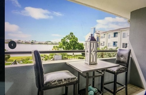 Slidell Condo | Waterfront, Amazing sunset overlooking pool.