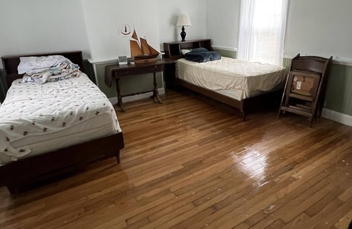 Piney Point House | Waterfront cottage with private pier, fireplace, and large yard.