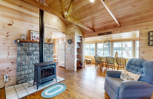 South China Cabin | Waterfront, dog-friendly cabin on China Lake with dock, canoe & firepit