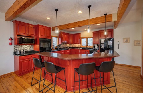 Waterfront Greens House | Waterfront Dreams: Lakefront, Indoor Pool, Dock Slip & Hot Tub!