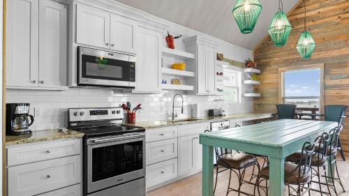 Flour Bluff House | Waterfront Escape w Views Shared Pool Boat Dock Orange Crush by AvantStay