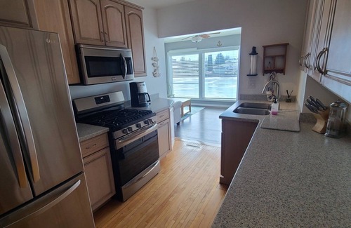 Algoma House | Waterfront Getaway with Boat Slip/Dock and Spectacular Sunsets on Ahnapee River