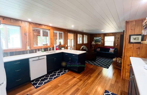 Lake Leelanau Cabin | Waterfront home and guest cottage on Lake Leelanau. Pet ok. Sleeps 11.