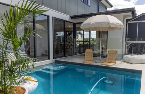 Mountain Creek House | Waterfront home with a pool, designed for families with everything you need.