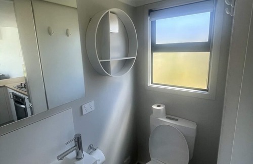 Kawhia Cottage | Waterfront Tiny House on Kawhia Harbour.