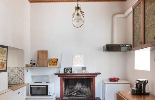 Poros House | Waterfront townhouse with private garden