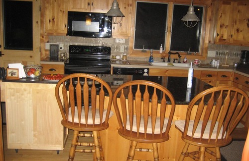 Oshkosh House | WATERFRONT VIEWS From EVERY Window! CABIN LODGE ON WATER & CLOSE TO EVERYTHING!