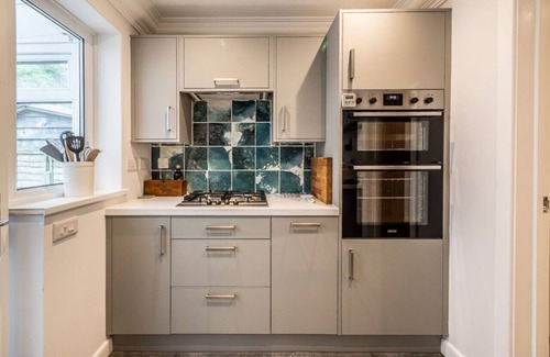 Ebford House | Waterside retreat with estuary views and balcony