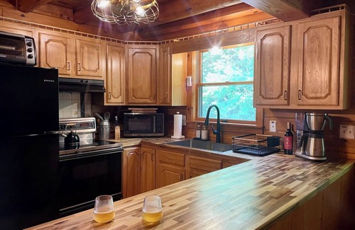 Livingston Manor House | Welcome to Elk Point! A cozy 2 BR/2 BA cabin with mountain views, woodstove, deck, and fire pit. Hiking trails right nearby, with Livingston Manor just a 10‑minute drive away.
