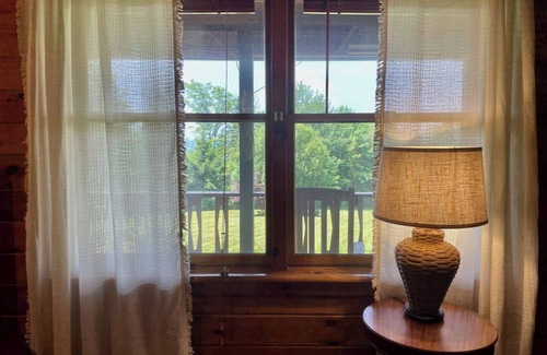 Livingston Manor House | Welcome to Elk Point! A cozy 2 BR/2 BA cabin with mountain views, woodstove, deck, and fire pit. Hiking trails right nearby, with Livingston Manor just a 10‑minute drive away.