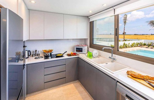 Softades House | Welcome to this stunning, modern villa, which sits within an exclusive gated complex surrounded by f