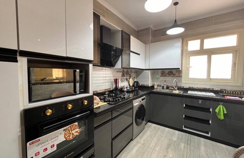 Sheikh Zayed City Apartment | Welcoming 3-bedroom apartment with AC in Sheikh Zayed neer Arkan, mall of Arabia