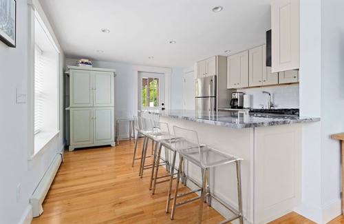 Provincetown Condo | West End 2 BR 2 BA with bonus queen sleep sofa, private farmers porch & parking