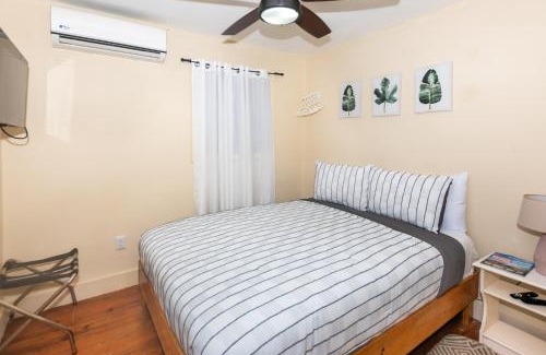 Half Moon Bay Apartment | West End Inn Beachfront Hotel Room in West End