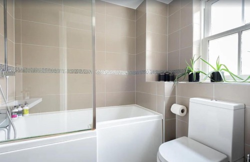 Chaucer Apartment | Westminter 4BR with patio condo