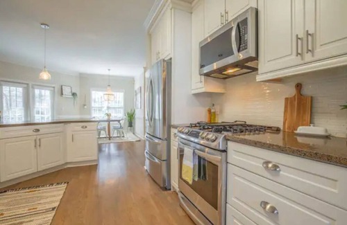 Five Forks House | Whimsical 4 bedroom house with a cozy backyard