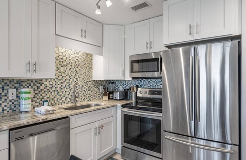 Fort Walton Beach - Destin Condo | Windancer 202. Renovated Gulf Front Condo, Free Beach Service, Pool, Grill